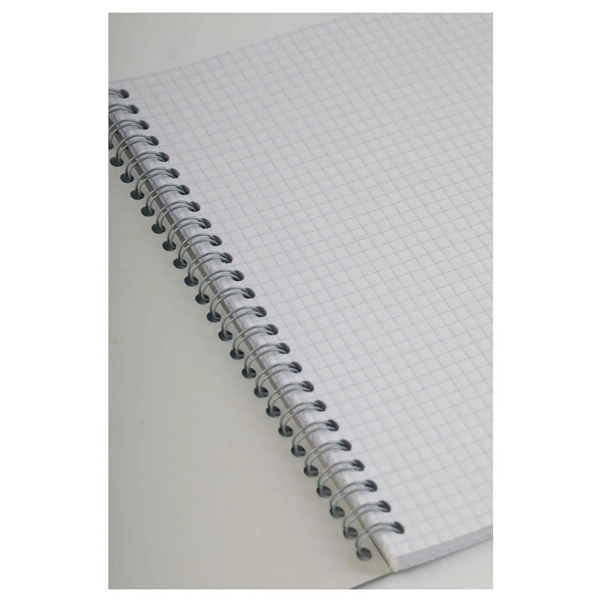 Cahier à spirale 17x22cm - Réglure 5x5 - CONQUERANT photo du produit